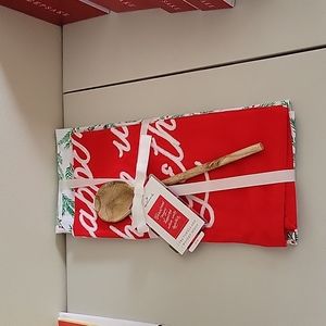 Brand new Hallmark 2 Tea towels and one wooden spoon.